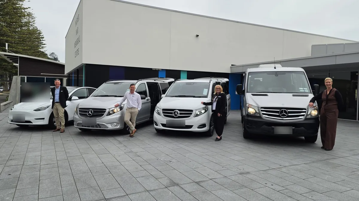 Electric Executive hosts with the fully electric Tesla Model Y and Mercedes-Benz eVito, and the diesel Mercedes-Benz V-Class and Sprinter, outside the Napier War Memorial Centre